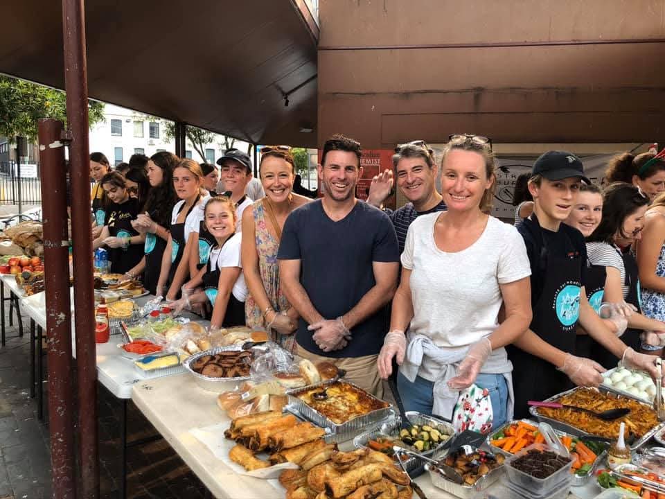 The Street Buffet table set with a full spread of hot food
